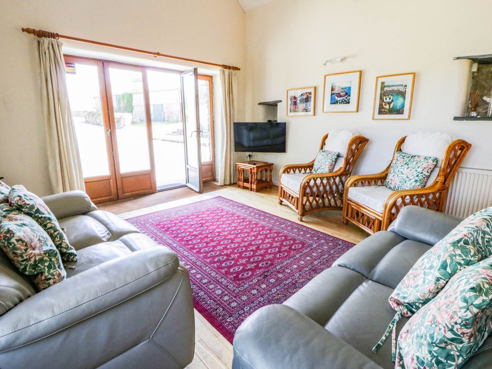 Sitting area with sofa and armchairs
