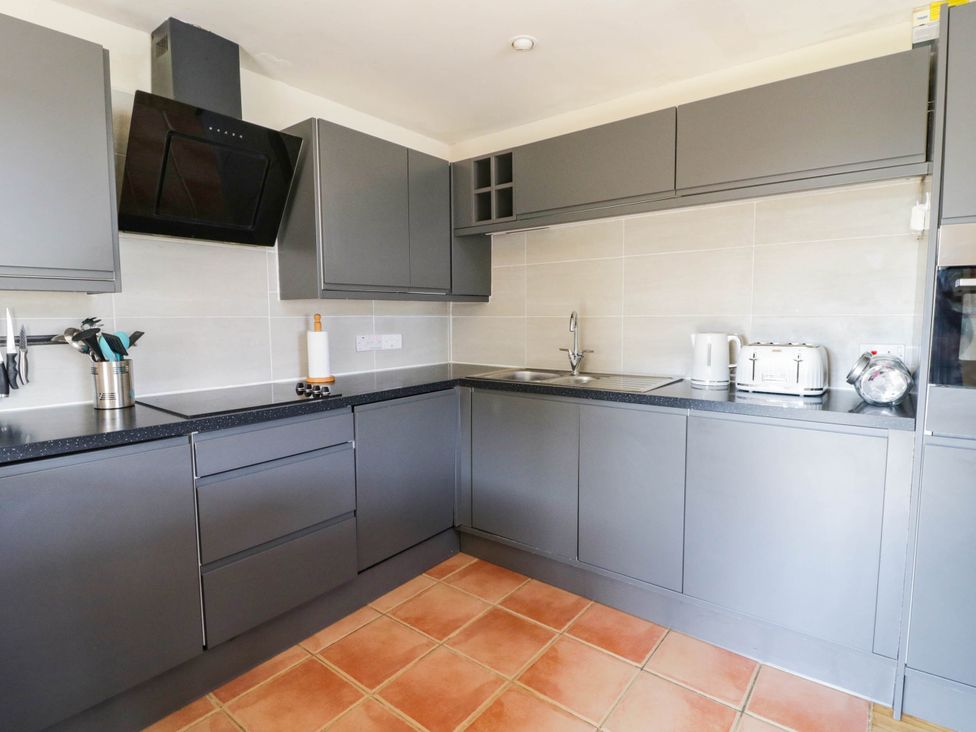 Kitchen worktop with sink, toaster and kettle