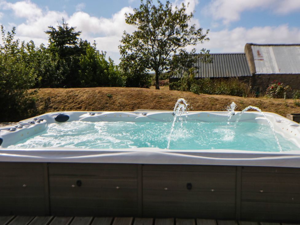 Swim spa with water jets in the garden